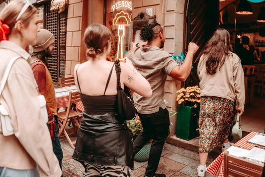 Food tour group walking into a new venue